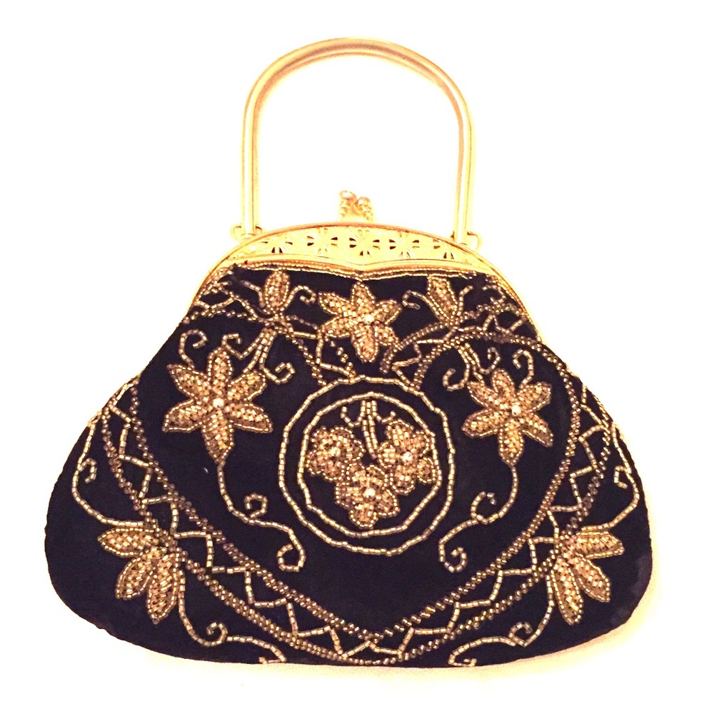 Black and gold embellished clutch. Unbranded